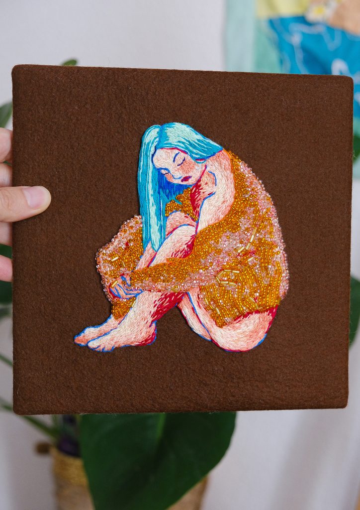 beaded embroidery women in her cardigan