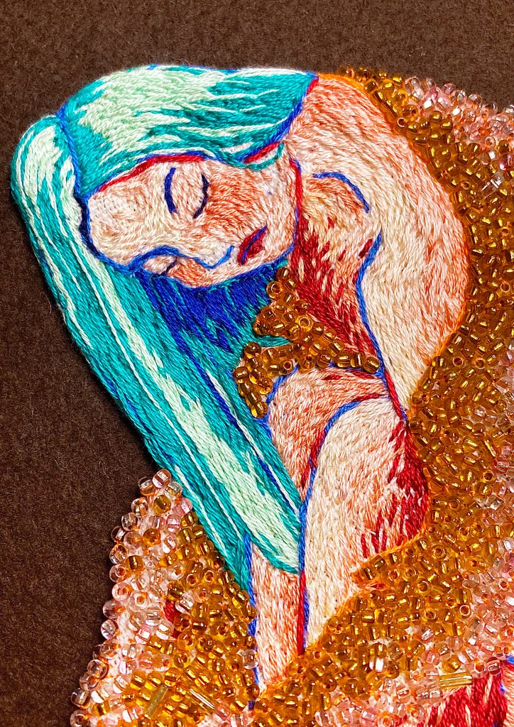 beaded embroidery women in her cardigan